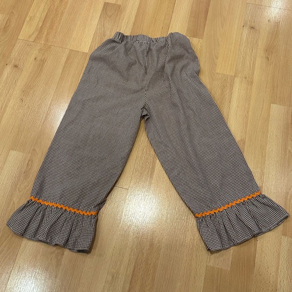 Black gingham pants with orange Rick rack detail and ruffle - Picture 4 of 6